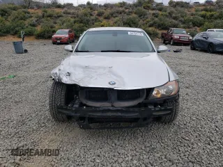 2006 BMW 3 Series 325i with VIN WBAVB13506KR59910, listed as a Copart auction lot 54754715 with 107,181 mi miles and Salvage title. Bid and sale history available at DreamBid. Image 5.