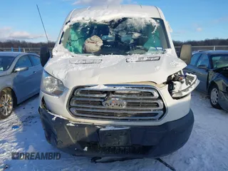 2018 Ford Transit Passenger XL z VIN 1FBAX2CM1JKA97858, wystawiony jako IAAI lot #41285058 z przebiegiem 252 805 mil mil oraz . Historia ofert i sprzedaży dostępna na DreamBid. Obrazek 12.