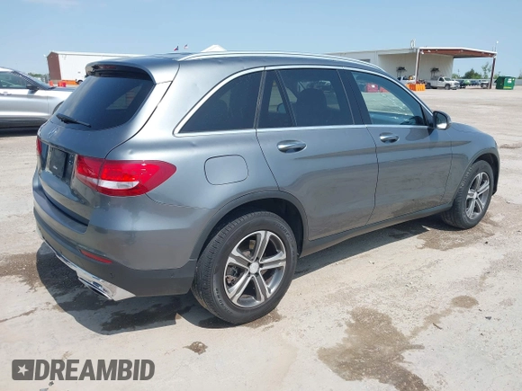 2016 Mercedes-Benz GLC with VIN WDC0G4JB4GF084697, listed as a IAAI auction lot 41929271 with 129,146 mi miles. Bid and sale history available at carsss.com. Image 4.