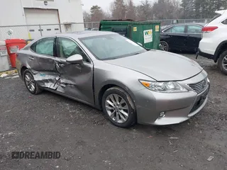 2015 Lexus ES 300h z VIN JTHBW1GG7F2100317, wystawiony jako IAAI lot #41738577 z przebiegiem 78 597 mil mil oraz . Historia ofert i sprzedaży dostępna na DreamBid. Obrazek 1.