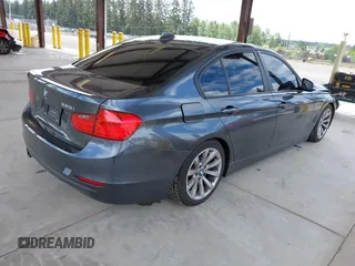 2013 BMW 3 Series 328i with VIN WBA3C1G51DNN94132, listed as a IAAI auction lot 42259019 with 96,875 mi miles and . Bid and sale history available at DreamBid. Image 4.