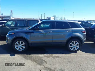 2016 Land Rover Range Rover Evoque SE z VIN SALVP2BG9GH136803, wystawiony jako IAAI lot #39655067 z przebiegiem 153 434 mil mil oraz . Historia ofert i sprzedaży dostępna na DreamBid. Obrazek 14.