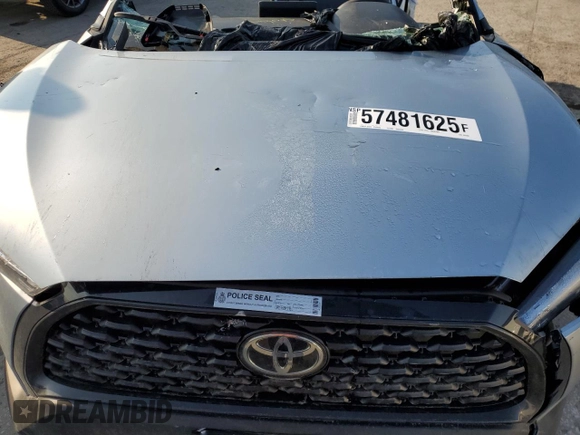 2023 Toyota Corolla Cross L z VIN 7MUAAAAG0PV064006, wystawiony jako Copart lot #57481625 z przebiegiem Nie podano mil oraz Nie do naprawy • Non repairable. Historia ofert i sprzedaży dostępna na DreamBid. Obrazek 12.