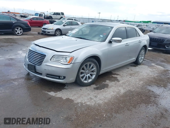 2012 Chrysler 300 Limited with VIN 2C3CCACGXCH212881, listed as a IAAI auction lot 41882643 with 160,645 mi miles. Bid and sale history available at carsss.com. Image 2.