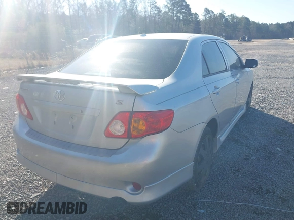 2009 Toyota Corolla with VIN 1NXBU40E29Z064526, listed as a IAAI auction lot 41790965 with 122,578 mi miles. Bid and sale history available at carsss.com. Image 4.