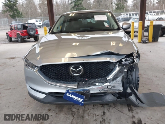 2020 Mazda CX-5 Grand Touring with VIN JM3KFADM0L0738693, listed as a IAAI auction lot 41725906 with 63,629 mi miles. Bid and sale history available at carsss.com. Image 13.