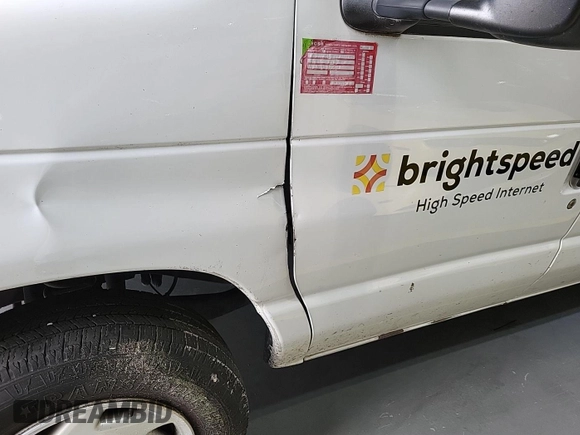 2013 Ford Econoline Cargo Commercial with VIN 1FTNE1EW6DDB01438, listed as a IAAI auction lot 42737683 with 125,160 mi miles and . Bid and sale history available at DreamBid. Image 30.