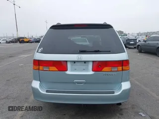 2003 Honda Odyssey EX-L with VIN 5FNRL18943B138444, listed as a IAAI auction lot 41498605 with 153,947 mi miles and . Bid and sale history available at DreamBid. Image 17.