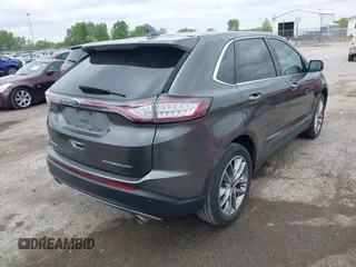 2015 Ford Edge Titanium z VIN 2FMTK3K81FBB88882, wystawiony jako IAAI lot #42184698 z przebiegiem 161 858 mil mil oraz . Historia ofert i sprzedaży dostępna na DreamBid. Obrazek 4.