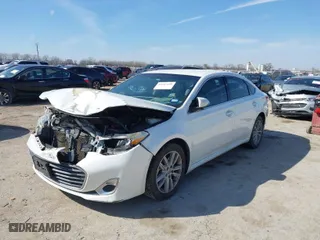 2015 Toyota Avalon Limited with VIN 4T1BK1EB8FU160482, listed as a IAAI auction lot 41663109 with 169,934 mi miles. Bid and sale history available at carsss.com. Image 2.