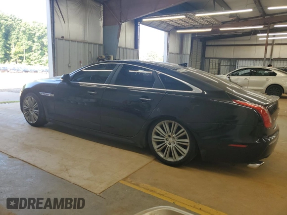 2015 Jaguar XJ with VIN SAJWJ1CD9F8V83885, listed as a Copart auction lot 65625135 with 81,794 mi miles and Clean title. Bid and sale history available at DreamBid. Image 2.