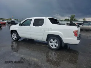 2010 Honda Ridgeline RTL z VIN 5FPYK1F53AB006195, wystawiony jako Copart lot #52528435 z przebiegiem 205 522 mil mil oraz Szkoda całkowita • Salvage title. Historia ofert i sprzedaży dostępna na DreamBid. Obrazek 2.