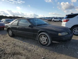 1996 Ford Thunderbird LX with VIN 1FALP62W1TH162826, listed as a Copart auction lot 87037034 with 181,379 mi miles and Clean Title. Bid and sale history available at DreamBid. Image 4.
