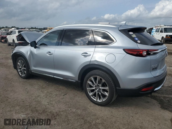 2016 Mazda CX-9 Signature with VIN JM3TCBEY1G0121667, listed as a Copart auction lot 54974805 with Not provided miles and Salvage title. Bid and sale history available at DreamBid. Image 2.