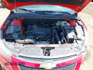 2014 Chevrolet Cruze 1LT z VIN 1G1PC5SBXE7230301, wystawiony jako IAAI lot #42403785 z przebiegiem 141 630 mil mil oraz . Historia ofert i sprzedaży dostępna na DreamBid. Obrazek 10.