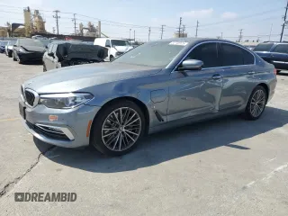 2018 BMW 5 Series 530e with VIN WBAJA9C56JB249919, listed as a Copart auction lot 52748125 with 67,433 mi miles and Salvage title. Bid and sale history available at DreamBid. Image 1.