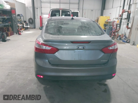 2014 Ford Focus SE with VIN 1FADP3F28EL285971, listed as a IAAI auction lot 41290979 with 149,900 mi miles. Bid and sale history available at carsss.com. Image 17.
