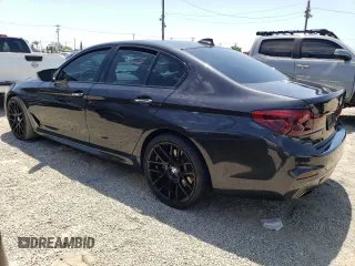 2018 BMW 5 Series 530e with VIN WBAJA9C55JG623181, listed as a Copart auction lot 61593983 with 63,577 mi miles and . Bid and sale history available at DreamBid. Image 2.