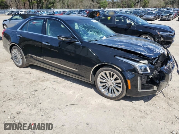 2014 Cadillac CTS Luxury AWD with VIN 1G6AX5S30E0130276, listed as a Copart auction lot 53934825 with 12,850 mi miles and Clean Title. Bid and sale history available at DreamBid. Image 4.
