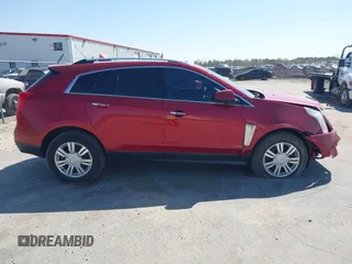 2015 Cadillac SRX Luxury Collection with VIN 3GYFNEE32FS539971, listed as a IAAI auction lot 41890592 with 90,843 mi miles. Bid and sale history available at carsss.com. Image 13.