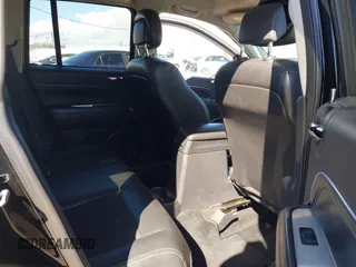 2016 Jeep Compass Latitude with VIN 1C4NJCEB2GD628384, listed as a IAAI auction lot 41752694 with 122,589 mi miles. Bid and sale history available at carsss.com. Image 8.