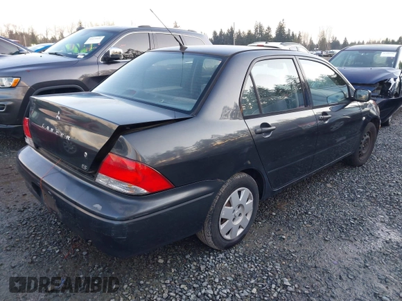 2003 Mitsubishi Lancer ES with VIN JA3AJ26E83U006060, listed as a IAAI auction lot 41254660 with 220,490 mi miles. Bid and sale history available at carsss.com. Image 4.