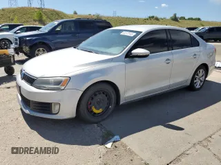 2012 Volkswagen Jetta PZEV with VIN 3VW4A7AJXCM123009, listed as a Copart auction lot 63573145 with 242,860 mi miles and Clean title. Bid and sale history available at DreamBid. Image 1.