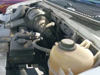 2001 Ford Econoline Cargo with VIN 1FTNE24291HB29632, listed as a IAAI auction lot 42950629 with 204,661 mi miles and . Bid and sale history available at DreamBid. Image 13.