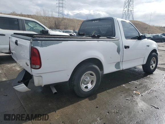 2002 Ford F-150 XL with VIN 1FTRF17212KC06180, listed as a Copart auction lot 45336625 with 214,139 mi miles and Salvage title. Bid and sale history available at DreamBid. Image 3.