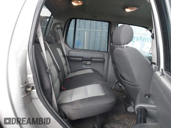 2005 Ford Explorer Sport Trac XLS with VIN 1FMZU67K95UA87785, listed as a IAAI auction lot 42207437 with 195,682 mi miles and . Bid and sale history available at DreamBid. Image 8.