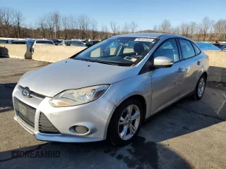 2013 Ford Focus SE z VIN 1FADP3F20DL180176, wystawiony jako Copart lot #80187343 z przebiegiem 129 737 mil mil oraz Czysty tytuł • Clean title. Historia ofert i sprzedaży dostępna na DreamBid. Obrazek 1.