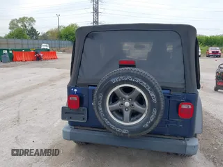 2004 Jeep Wrangler X with VIN 1J4FA39S64P726711, listed as a IAAI auction lot 42227336 with Not Provided miles and . Bid and sale history available at DreamBid. Image 16.