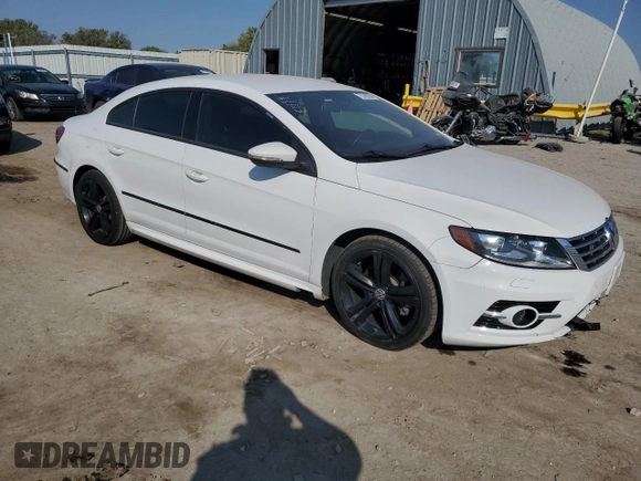 2014 Volkswagen CC R-Line with VIN WVWBN7AN2EE535855, listed as a Copart auction lot 75706934 with 148,889 mi miles and Salvage Title. Bid and sale history available at carsss.com. Image 4.