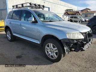 2004 Volkswagen Touareg with VIN WVGEM77LX4D071560, listed as a Copart auction lot 41630995 with 168,906 mi miles and Salvage title. Bid and sale history available at DreamBid. Image 4.