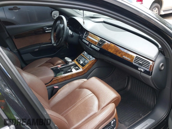 2015 Audi A8 3.0T z VIN WAU3GAFD4FN039482, wystawiony jako IAAI lot #42330349 z przebiegiem 132 718 mil mil oraz . Historia ofert i sprzedaży dostępna na DreamBid. Obrazek 5.