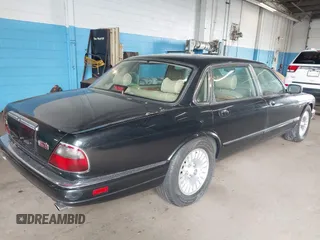 1997 Jaguar XJ Vanden Plas with VIN SAJKX6243VC800080, listed as a IAAI auction lot 42190859 with 192,979 mi miles and . Bid and sale history available at DreamBid. Image 4.