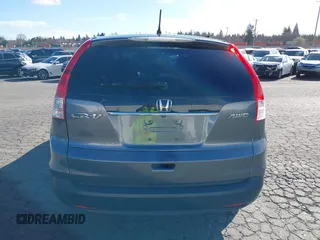 2014 Honda CR-V LX with VIN 2HKRM4H3XEH621242, listed as a IAAI auction lot 41734669 with 127,664 mi miles. Bid and sale history available at carsss.com. Image 16.