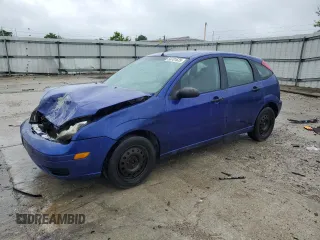 2005 Ford Focus S with VIN 3FAFP37N35R156460, listed as a Copart auction lot 58781635 with 231,066 mi miles and Salvage title. Bid and sale history available at DreamBid. Image 1.