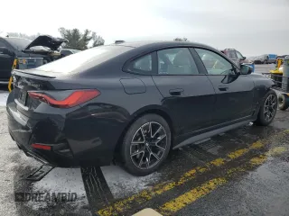 2022 BMW 4 Series M440i xDrive with VIN WBA13AW01NFL97602, listed as a Copart auction lot 43349585 with 46,123 mi miles and Salvage title. Bid and sale history available at DreamBid. Image 3.