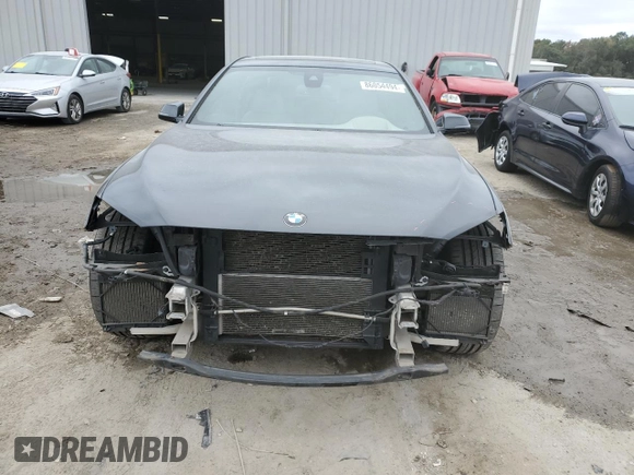 2013 BMW 7 Series 750Li z VIN WBAYE8C57DD133232, wystawiony jako Copart lot #86054494 z przebiegiem 118 438 mil mil oraz Szkoda całkowita • Salvage title. Historia ofert i sprzedaży dostępna na DreamBid. Obrazek 5.