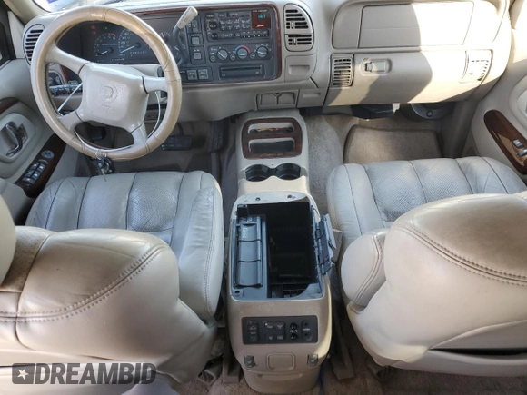 1999 Cadillac Escalade z VIN 1GYEK13R7XR402243, wystawiony jako Copart lot #43269935 z przebiegiem 231 465 mil mil oraz Czysty tytuł • Clean title. Historia ofert i sprzedaży dostępna na DreamBid. Obrazek 8.
