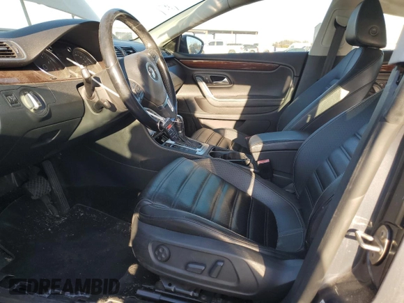 2012 Volkswagen CC Lux Limited with VIN WVWHN7AN5CE537803, listed as a Copart auction lot 82511734 with 124,416 mi miles and Salvage Title. Bid and sale history available at carsss.com. Image 7.