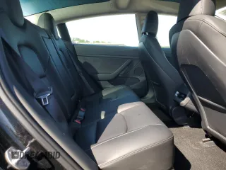 2023 Tesla Model 3 z VIN 5YJ3E1EA1PF547070, wystawiony jako Copart lot #55793205 z przebiegiem 38 591 mil mil oraz Szkoda całkowita • Salvage title. Historia ofert i sprzedaży dostępna na DreamBid. Obrazek 10.