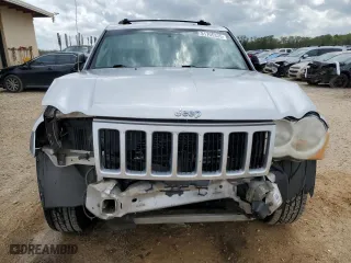 2010 Jeep Grand Cherokee Laredo with VIN 1J4PS4GK8AC146969, listed as a Copart auction lot 51705335 with 219,069 mi miles and Salvage Title. Bid and sale history available at carsss.com. Image 5.