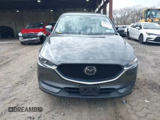 2021 Mazda CX-5 Touring with VIN JM3KFBCM8M0492145, listed as a IAAI auction lot 39077248 with 20,408 mi miles. Bid and sale history available at carsss.com. Image 12.
