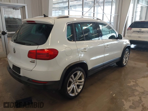 2016 Volkswagen Tiguan S with VIN WVGBV7AX0GW532236, listed as a IAAI auction lot 41610575 with 104,193 mi miles and . Bid and sale history available at DreamBid. Image 4.