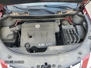 2013 Cadillac SRX Luxury Collection z VIN 3GYFNCE3XDS533241, wystawiony jako Copart lot #53933015 z przebiegiem 183 757 mil mil oraz Szkoda całkowita • Salvage title. Historia ofert i sprzedaży dostępna na DreamBid. Obrazek 11.