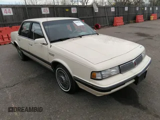 1990 Oldsmobile Cutlass Ciera with VIN 1G3AM54N4L6331841, listed as a IAAI auction lot 41805396 with 145,041 mi miles and . Bid and sale history available at DreamBid. Image 1.