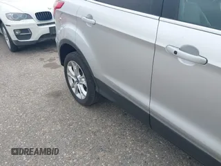 2016 Ford Escape Titanium with VIN 1FMCU9JX3GUC86930, listed as a IAAI auction lot 42582263 with 113,386 mi miles and . Bid and sale history available at DreamBid. Image 6.