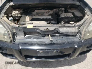 2006 Hyundai Tucson GL with VIN KM8JM12B66U342188, listed as a Copart auction lot 63140444 with 168,587 mi miles and Salvage Title. Bid and sale history available at carsss.com. Image 13.